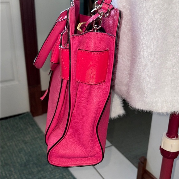 Kate Spade Satchel Crossbody bag
Leather Bright Pink/ bow front in patent EUC - Picture 6 of 17